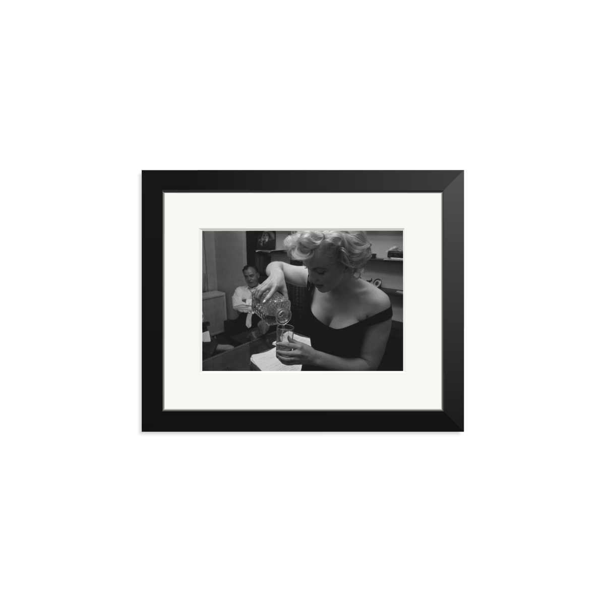 Marilyn Monroe Pouring A Drink Framed Print Black Small