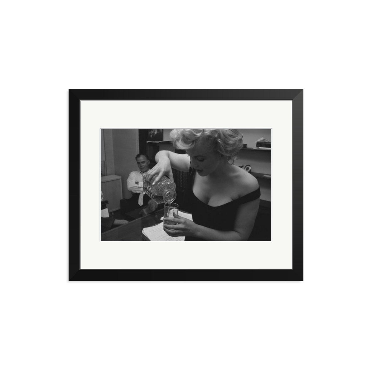Marilyn Monroe Pouring A Drink Framed Print Black Medium