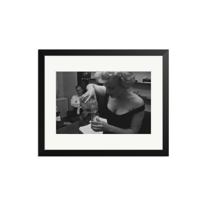 Marilyn Monroe Pouring A Drink Framed Print Black Medium