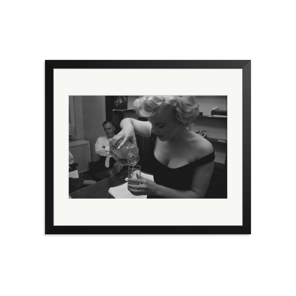 Marilyn Monroe Pouring A Drink Framed Print Black Large