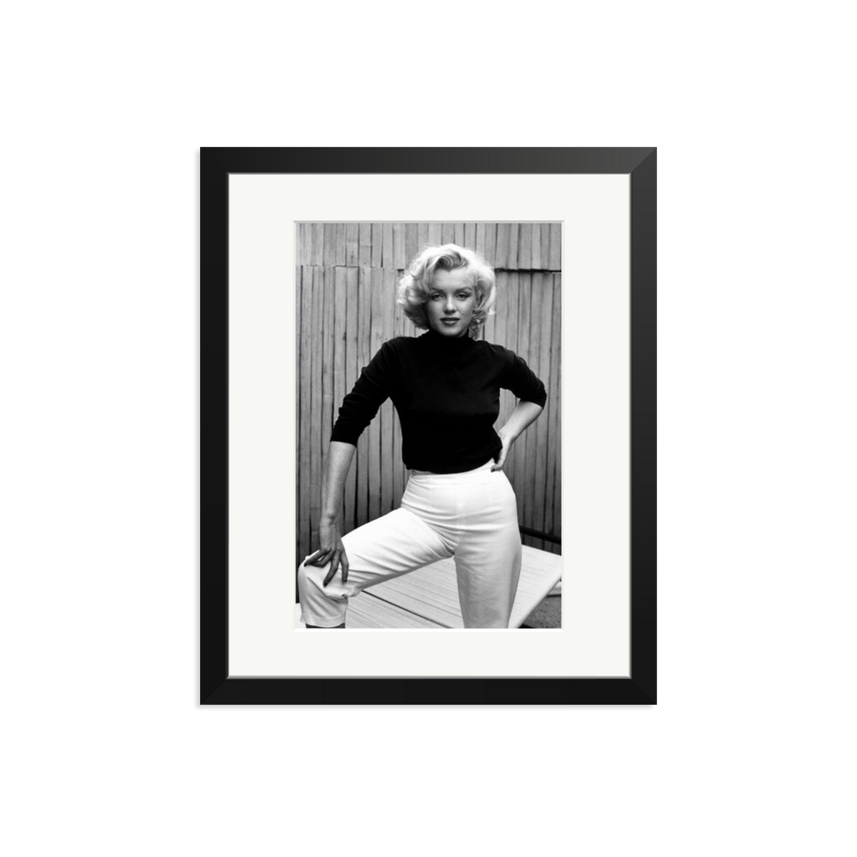 Marilyn Monroe Posing on Her Patio Framed Print Black Medium